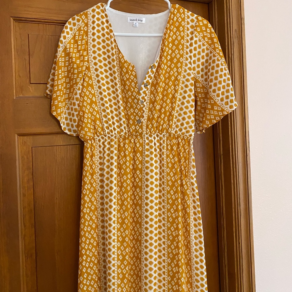 Mustard Wren and Ivory maxi dress.